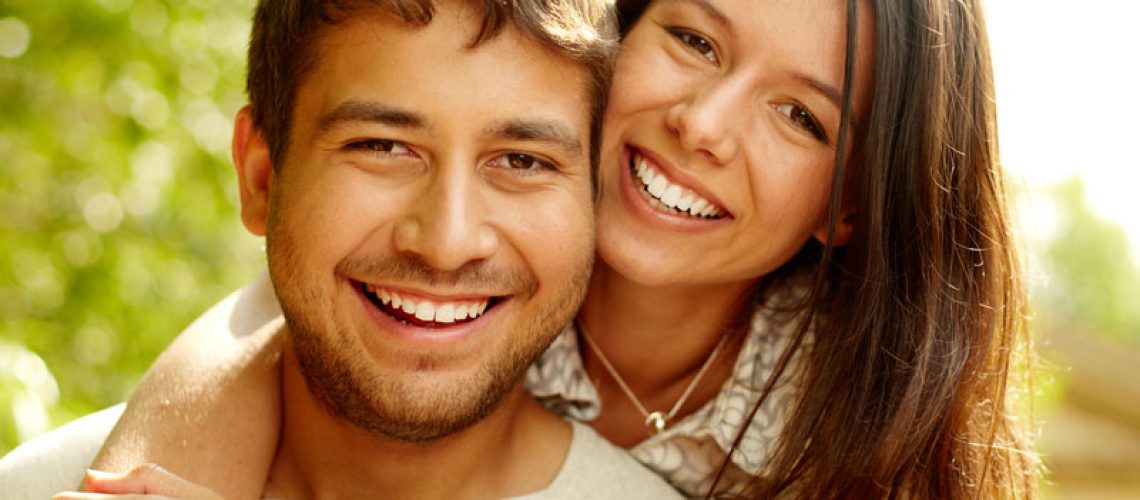 Dental Patients Smiling With Well Cared For Dental Implants In San Francisco, CA