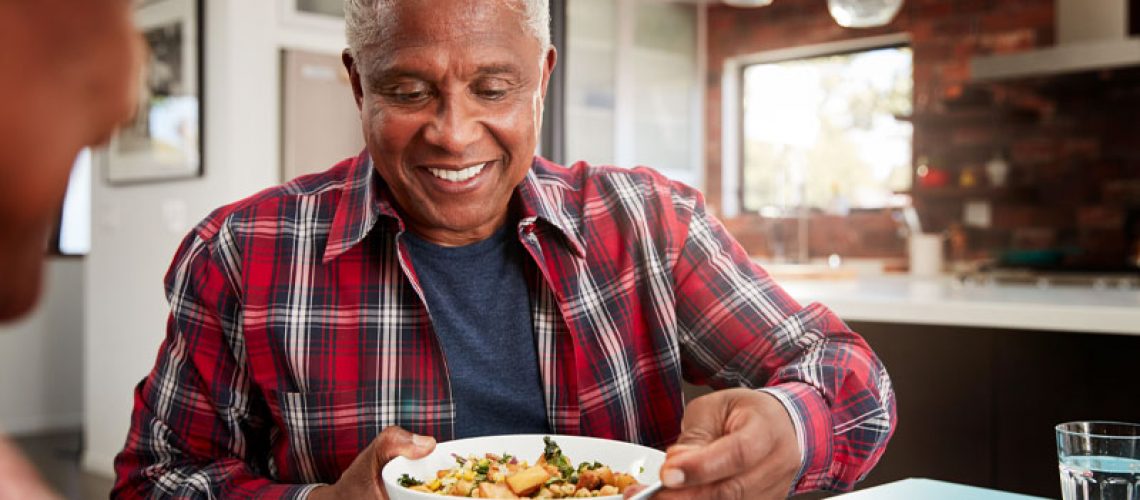Dental Implant Patient Eating After His Procedure
